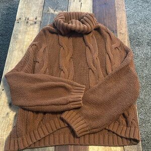 Chunky brown knit turtleneck sweater